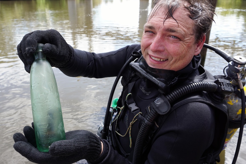 Diver Paul Szerenga with his latest find.