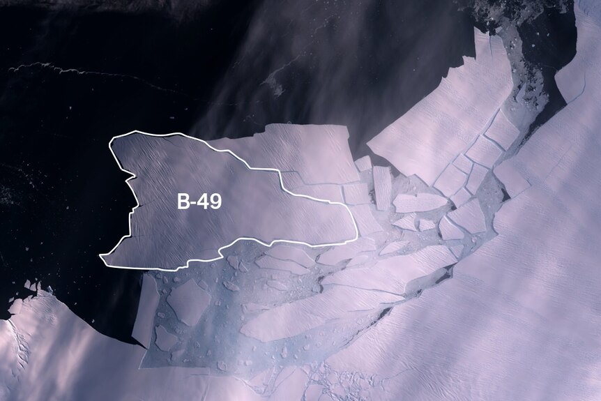 A satellite image of a glacier in Antarctica, showing an iceberg that has broken off.