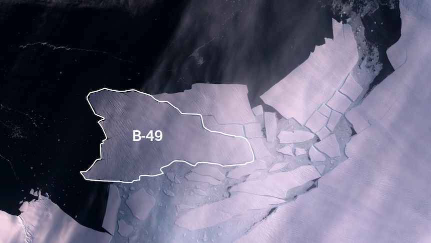 A satellite image of a glacier in Antarctica, showing an iceberg that has broken off.