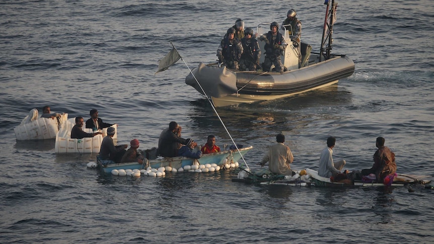 HMAS Darwin's inflatable boat "Pegasus" rescues 13 Iranian fishermen.