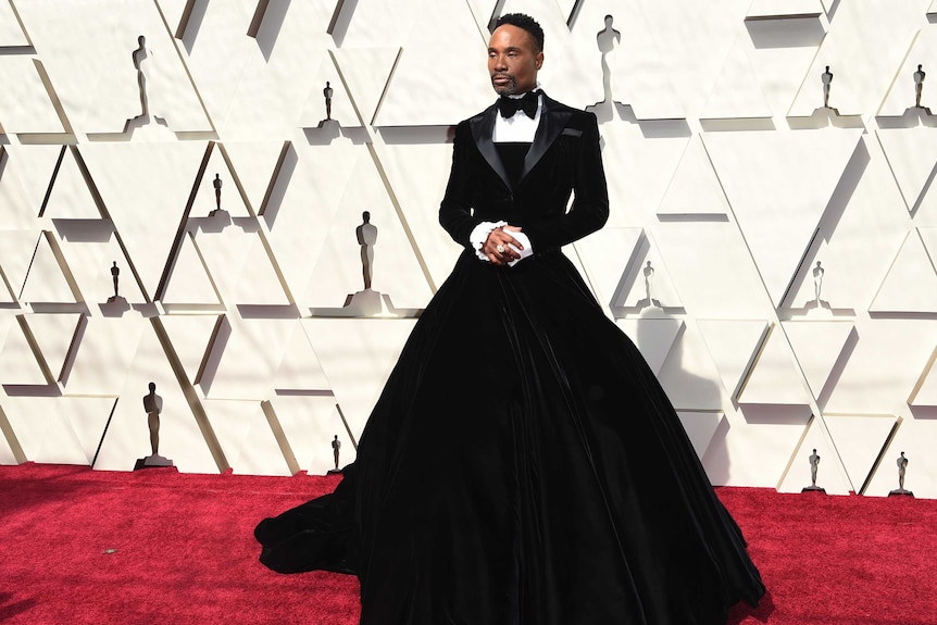 Billy Porter wears a tuxedo dress on the Oscars red carpet