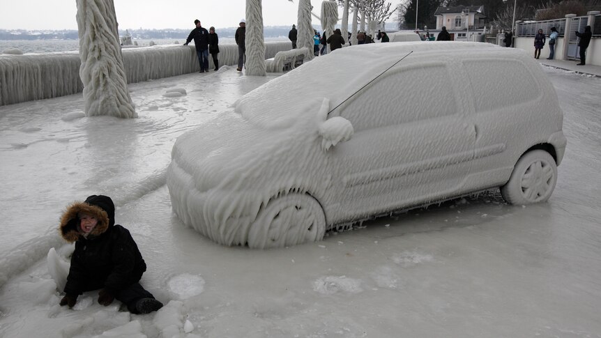 Arctic chill - an ice covered car in Versoix near Geneva
