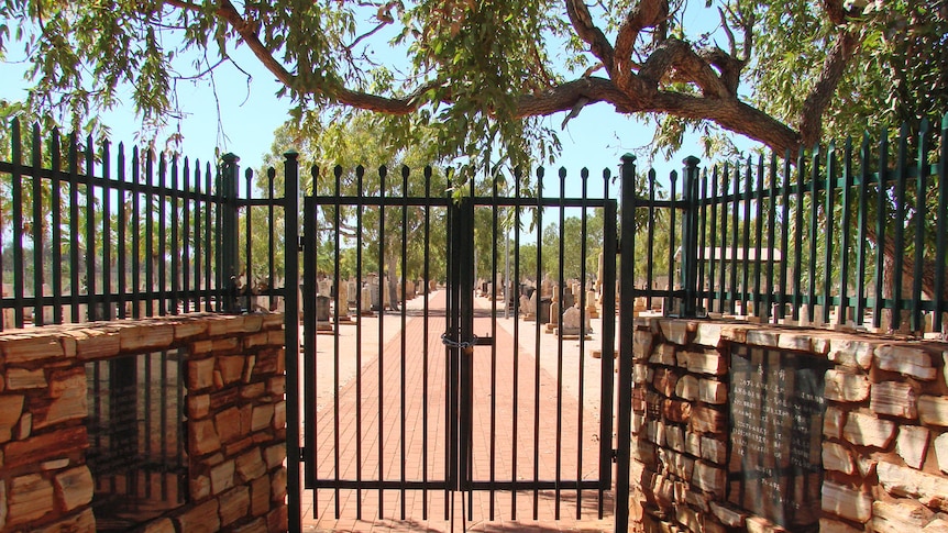 The locked gates of Broome's Japanese Cemetery, moments after Broome locals with Japanese heritage put a chain and padlock on the entrance.