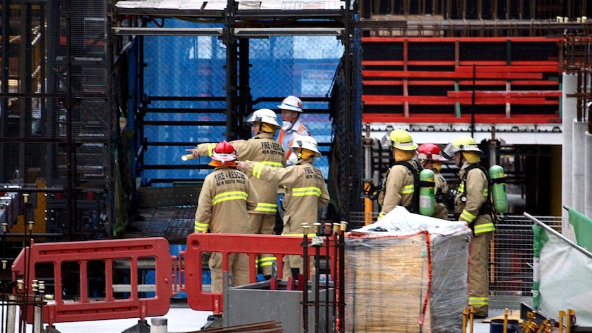 Firefighters gather at the Barangaroo construction site in the Sydney CBD on March 13, 2014.