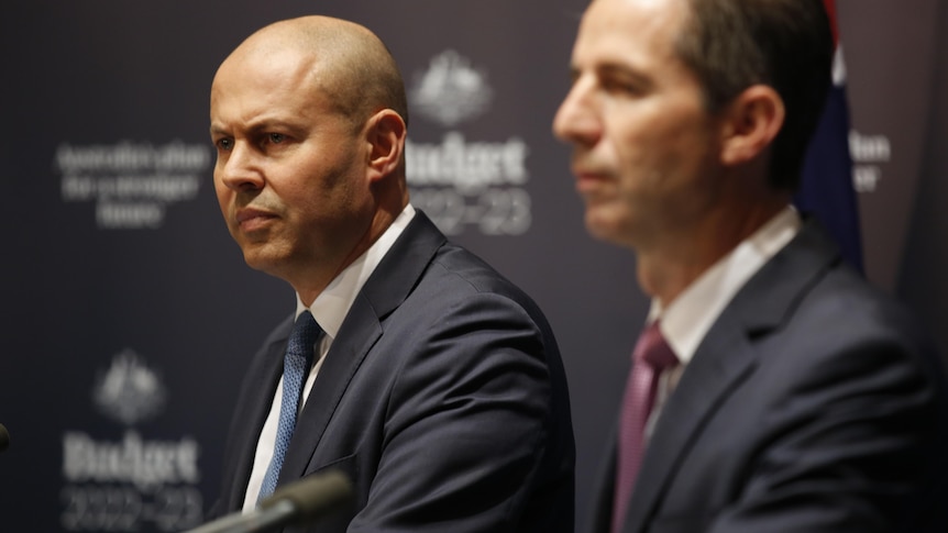 Simon Birmingham and Josh Frydenberg stand together at a press conference