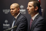 Simon Birmingham and Josh Frydenberg stand together at a press conference