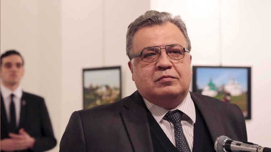 Andrei Karlov, the Russian Ambassador to Turkey, speaks at a photo exhibition in Ankara moments before he was shot.