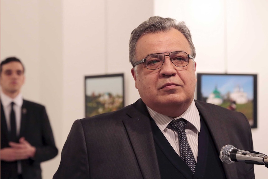 Andrei Karlov, the Russian Ambassador to Turkey, speaks at a photo exhibition in Ankara moments before he was shot.