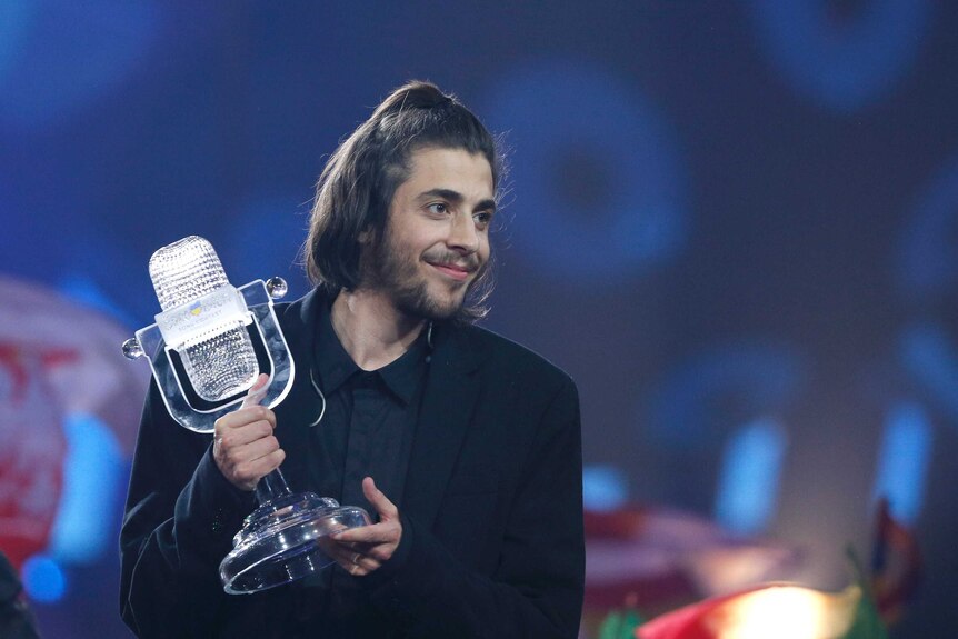 Portugal's Salvador Sobral celebrates after winning the grand final of Eurovision 2017.