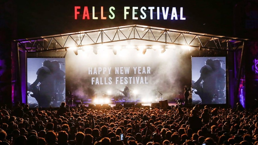 A photo of the main stage at Falls Festival in Marion Bay, Tas reading 'Happy New Year'