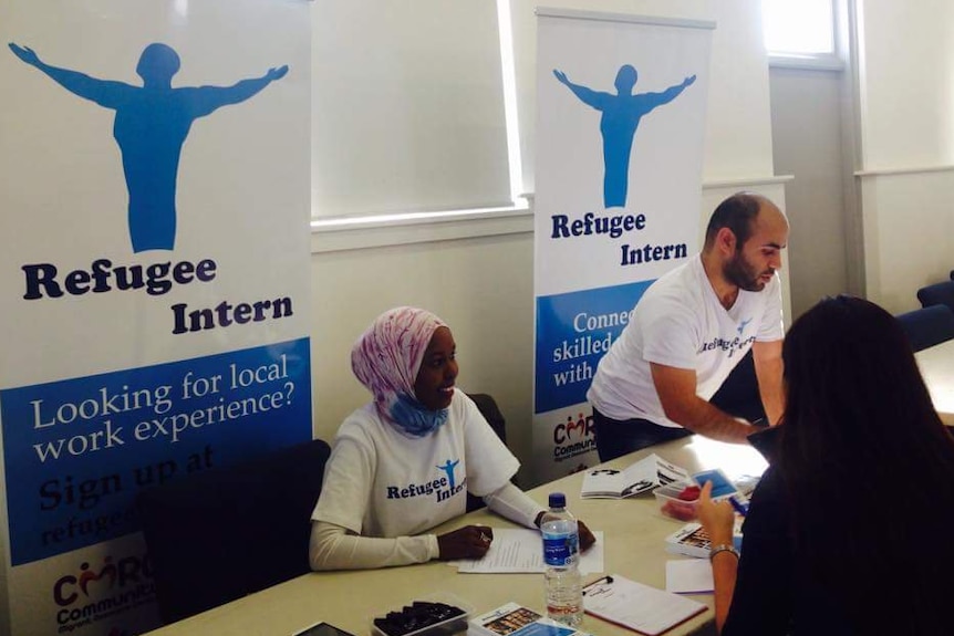 Refugee Talent co-founder Nirary Dacho and staff member at a careers expo for refugees