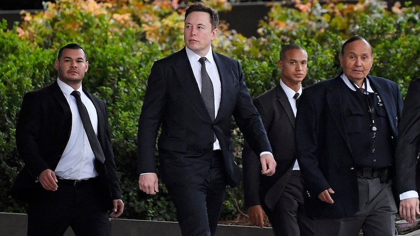 Elon Musk walking to court.