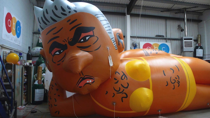 Balloon depicts Sadiq khan with a mad face and wearing a bikini
