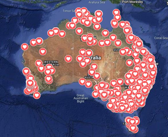 A map of Australia showing red hearts for women and children lost to violence.