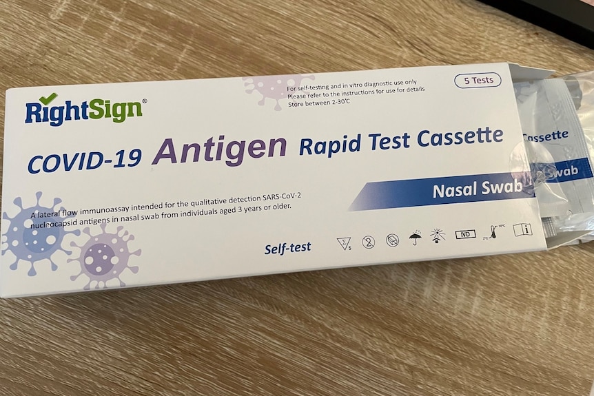 Open rapid antigen testing box.