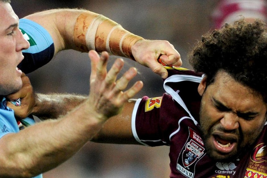Battle in the middle: The Blues have a tough task slowing down a big Maroons pack.