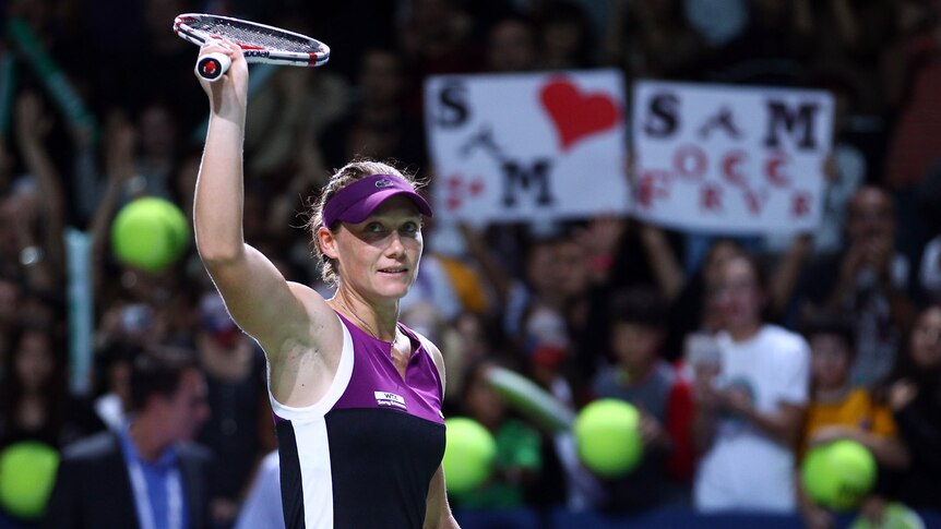 Smiling Samantha Stosur thanking the crowd at WTA Champs