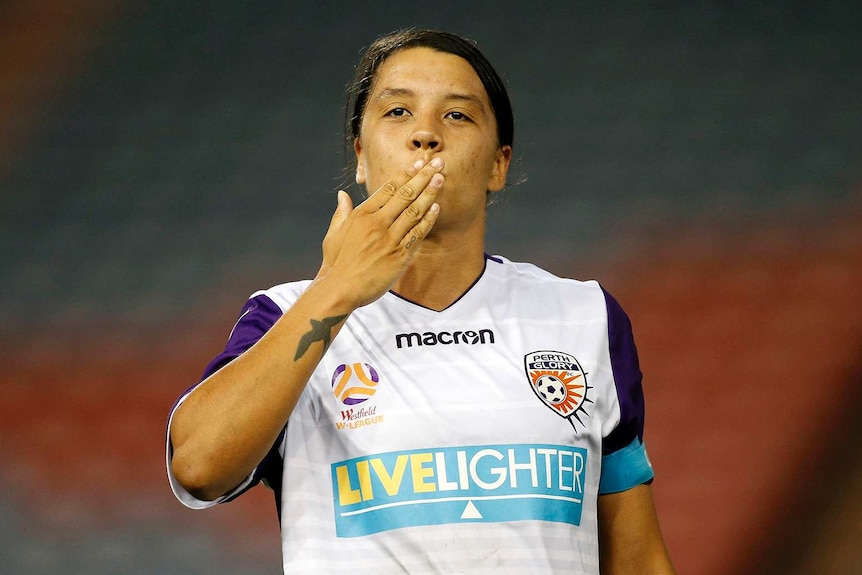 Sam Kerr of Perth Glory celebrates by blowing a kiss during a W-League match.