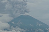 Mt Agung has been hurling clouds of white and grey ash.