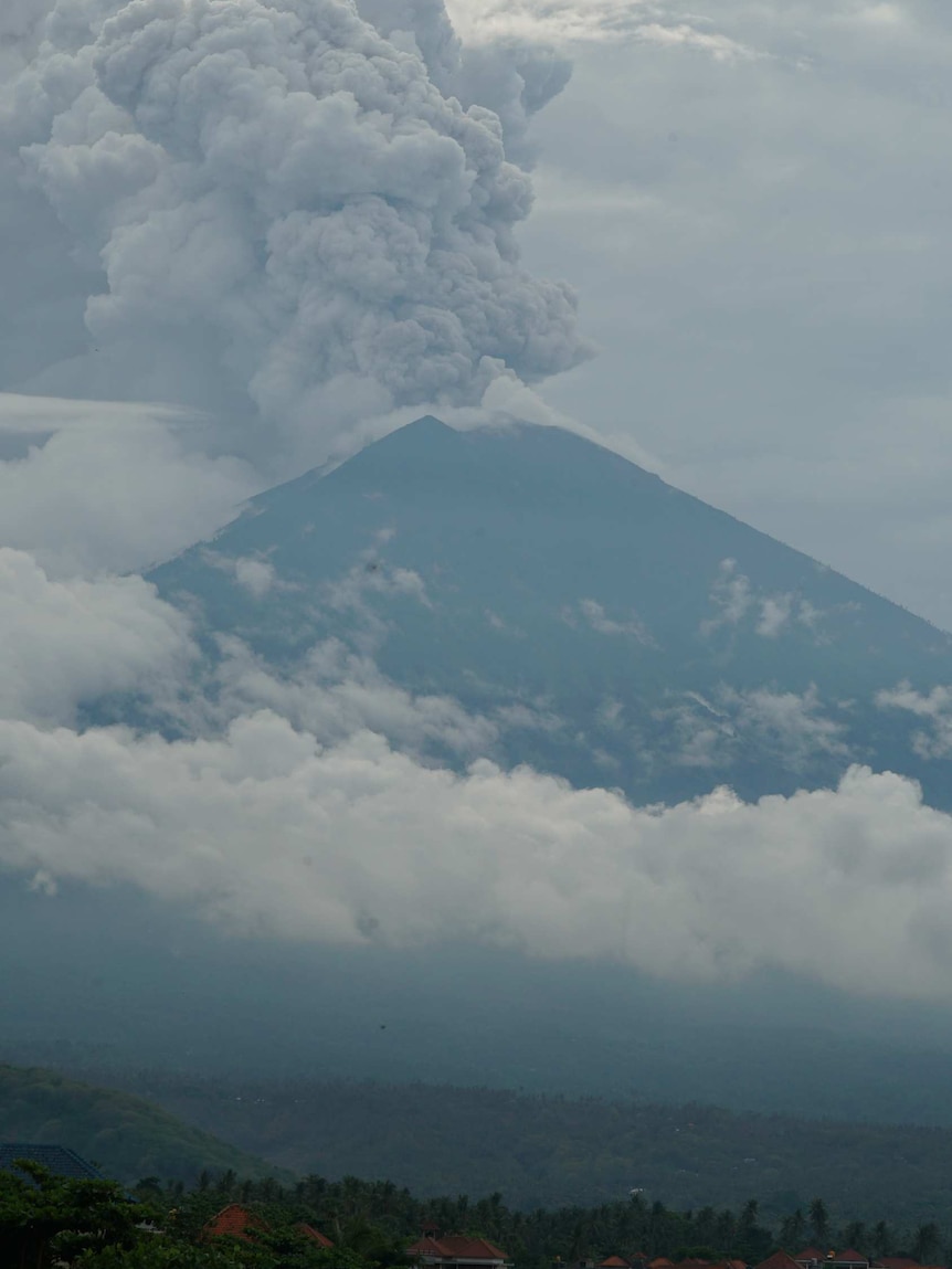 Mt Agung has been hurling clouds of white and grey ash.