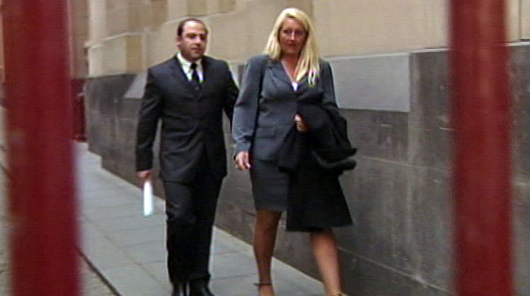 Nicola Gobbo walks outside court with Tony Mokbel