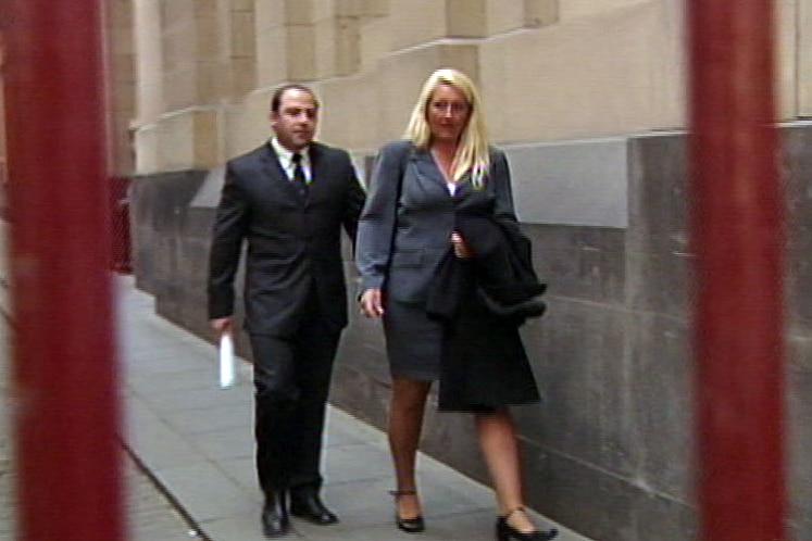 Nicola Gobbo walks outside court with Tony Mokbel