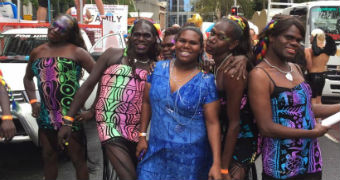Six of the Sistagirls pose and smile at the camera at Mardi Gras.