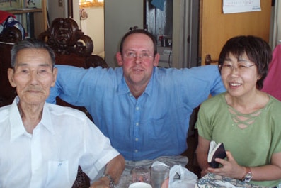Author Charles Happell with Kokichi Nishimura and his daughter, Sachiko