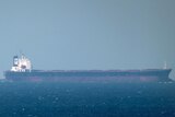 An oil tanker cruises towards the Strait of Hormuz.