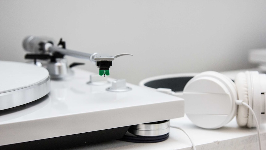 All in white, a record player for listening to white unlabelled records.