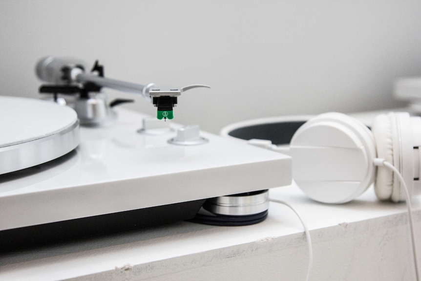 All in white, a record player for listening to white unlabelled records.