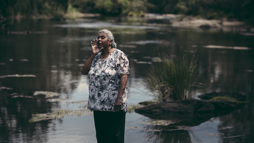 Portrait of Aboriginal elder Gwen Williams beside the Richmond River in Casino