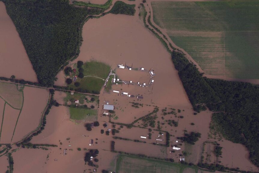 Satellite imagery shows an area near Abbeville, Louisiana, under floodwaters.