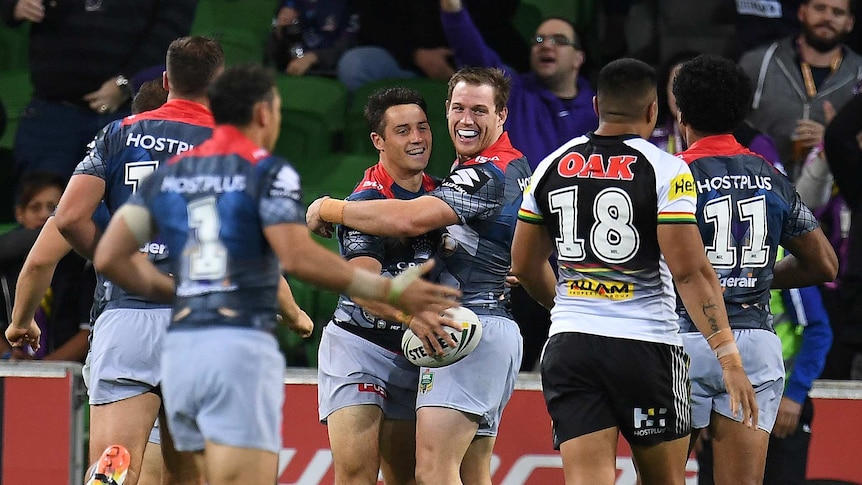 Storm celebrates Cooper Cronk try against Penrith