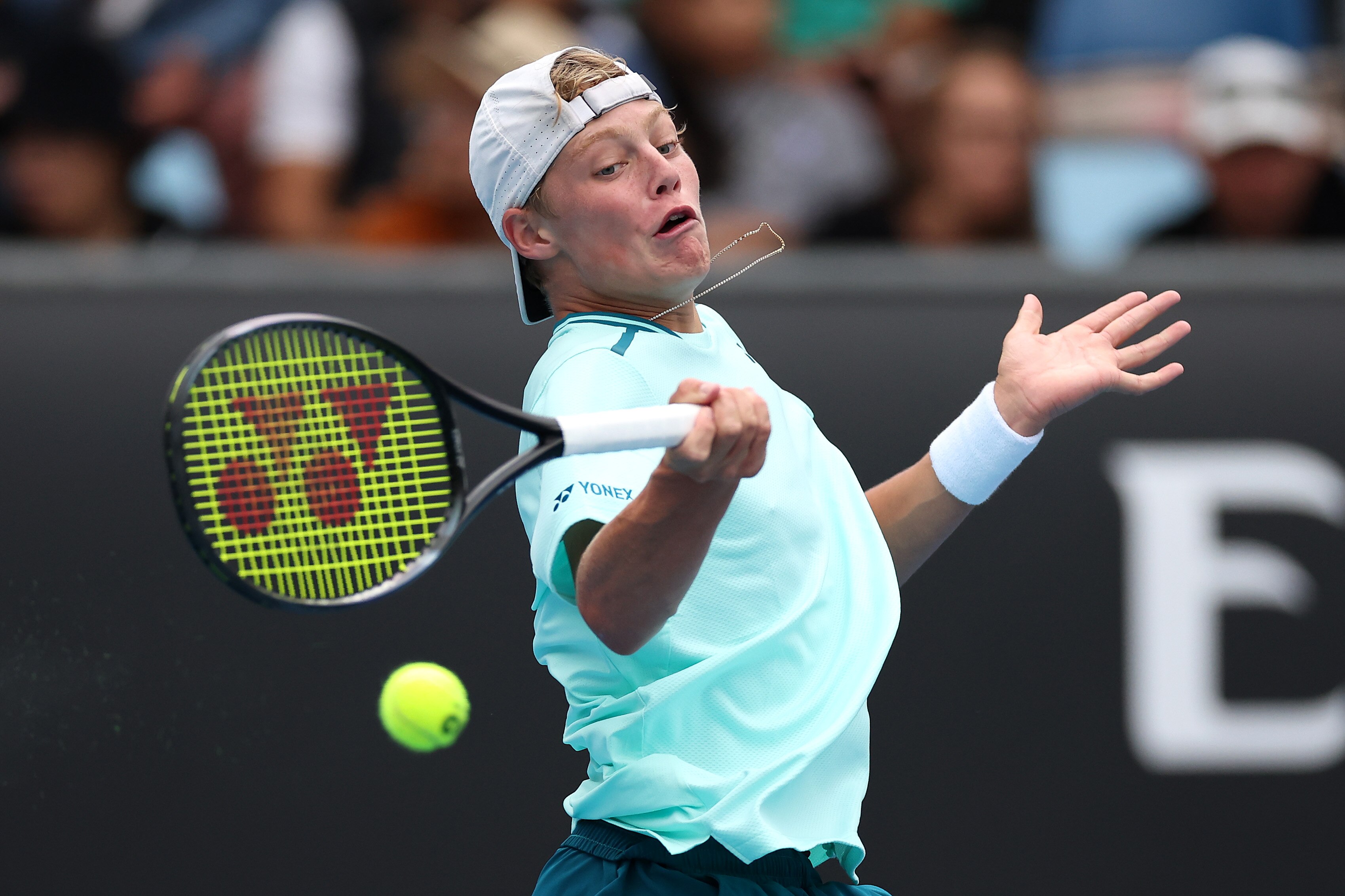 Cruz Hewitt plays a forehand at the 2024 Australian Open.