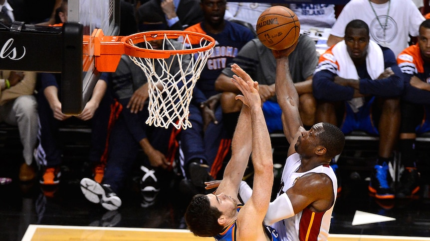 Miami's Dwyane Wade drives for a shot against Oklahoma in game four of the 2012 NBA Finals.