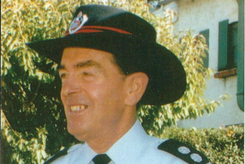 Mid shot of a man in a police uniform