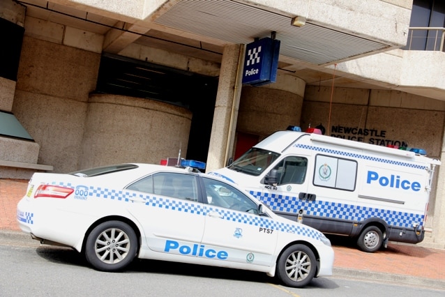 NSW Police generic, a car and a mobile unit outside Newcastle police station.
