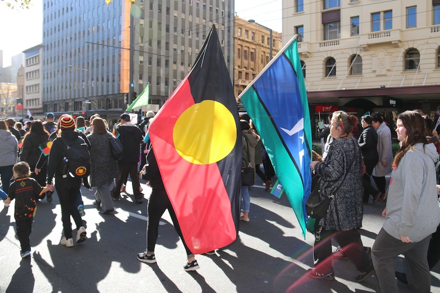 People join NAIDOC march in Adelaide.