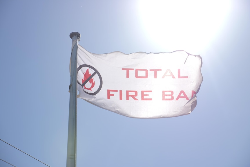 A flag saying Total Fire Ban