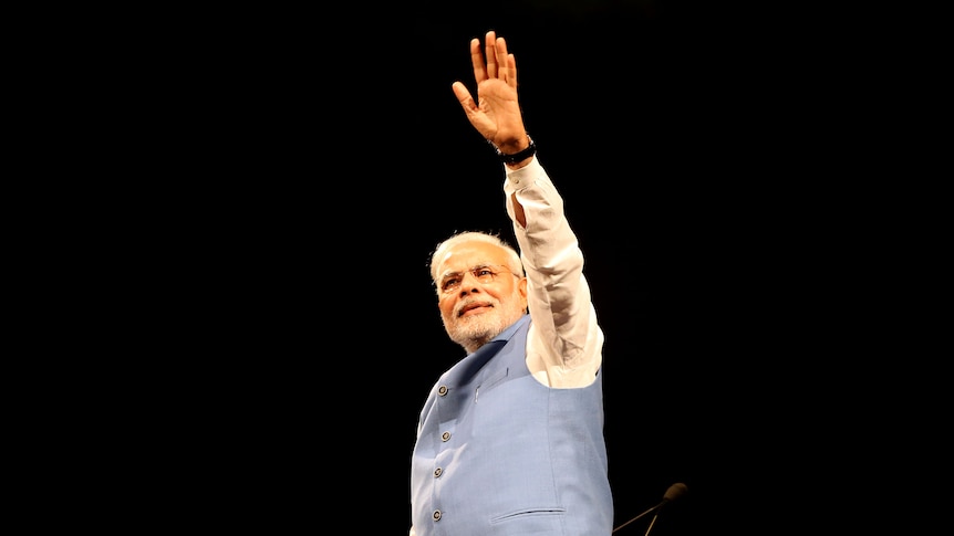 Modi waves to the crowd in Sydney