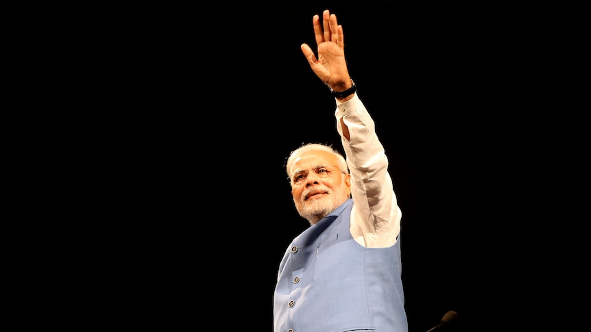 Modi waves to the crowd in Sydney