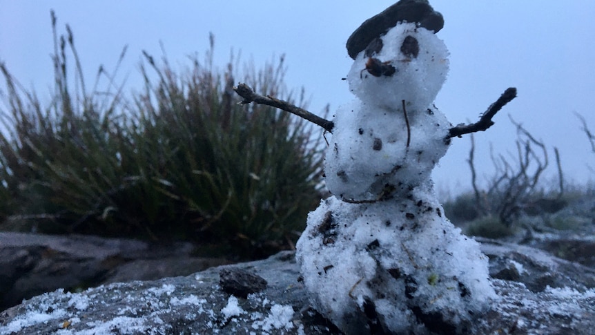 It may be small but it's still a snowman, built by hikers on Bluff Knoll.