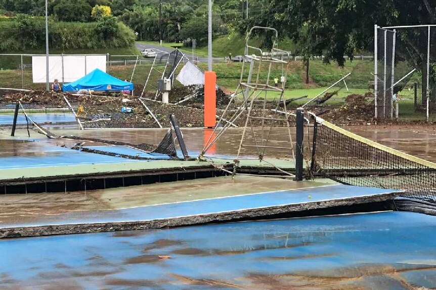 Damaged tennis court at the Redlynch Valley Tennis Club in Cairns on March 28, 2018 after floods.