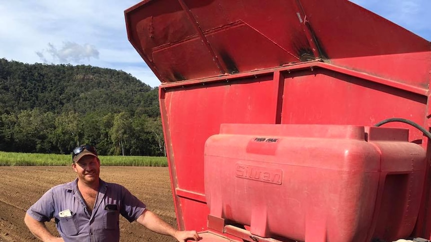 man with fertiliser sprayer