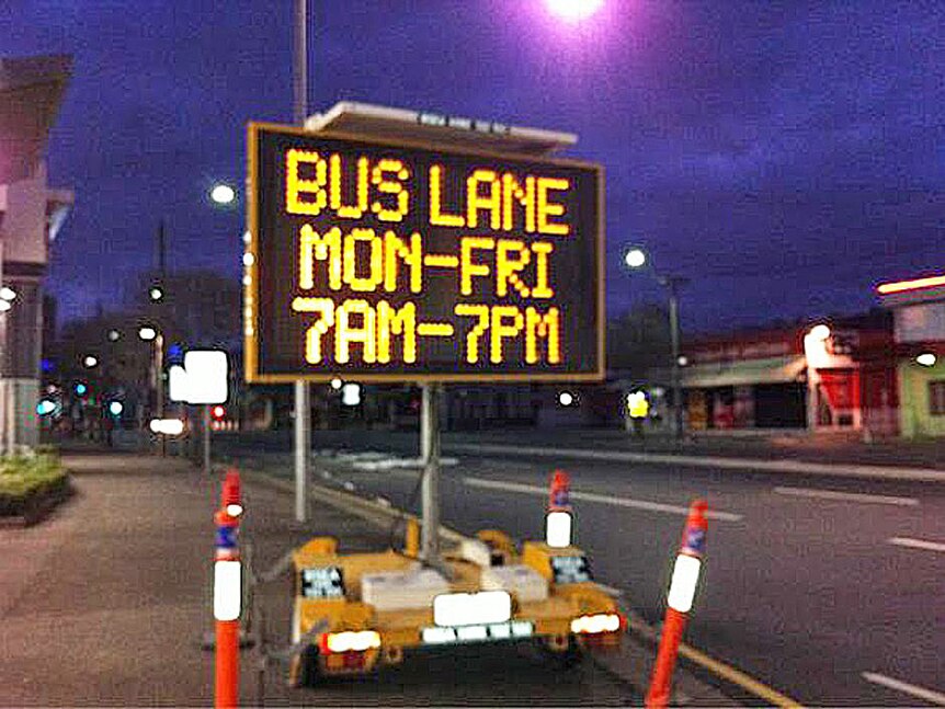 Sign warns of a new buses-only lane