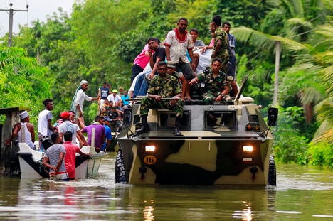 Sri Lanka has appealed for outside help as dozens were killed in floods and mudslides.