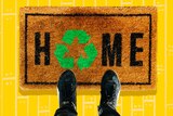 Feet on a doormat that says 'Home' for a quiz on Australians being sustainable at home