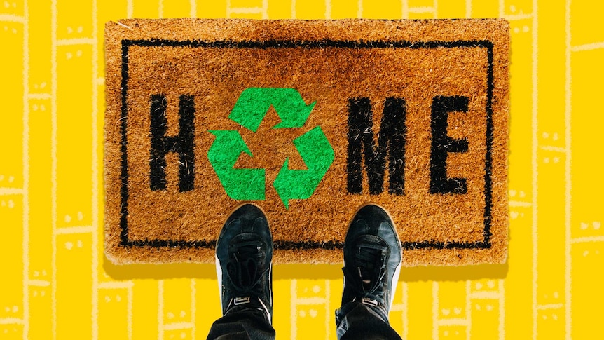 Feet on a doormat that says 'Home' for a quiz on Australians being sustainable at home