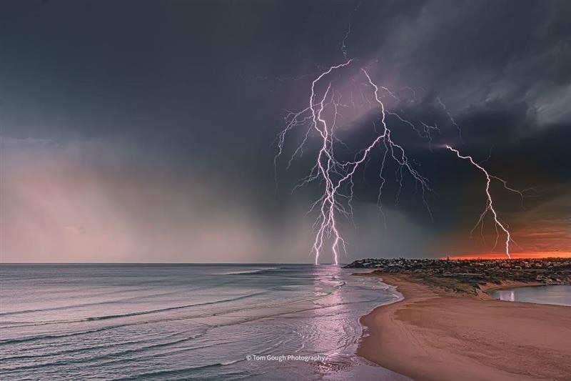 Lightning strikes over the beach